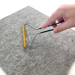 Rensev�rkt�j til uld strygem�tte